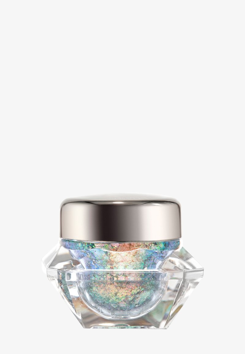 Barattolo di cristallo con coperchio in metallo argento, che mostra un prodotto multicolore e iridescente all'interno, con un design geometrico a forma di diamante.
