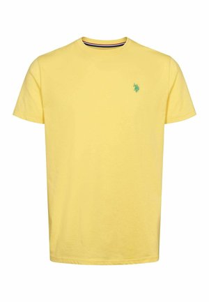 Żółta bawełniana koszulka z okrągłym dekoltem, krótkimi rękawami i małym zielonym logo na lewej piersi. Miękka tekstura i prosty design.