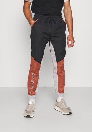 MONTEREY - Tracksuit bottoms - black/caramel/smoke
