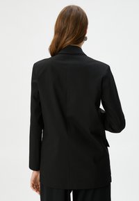 Koton POCKETDETAIL DOUBLE BREASTED - Short coat - black
