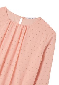 Blusa pesca con scollatura rotonda, caratterizzata da motivi a pois dorati e pieghe. Include una chiusura a chiave sul retro e maniche lunghe.