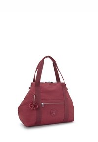 Czerwona torba tote z podwójnymi uchwytami, zapięciem na zamek błyskawiczny i przednią kieszenią. Posiada okrągłe logo oraz futrzany breloczek. Teksturowana powierzchnia.