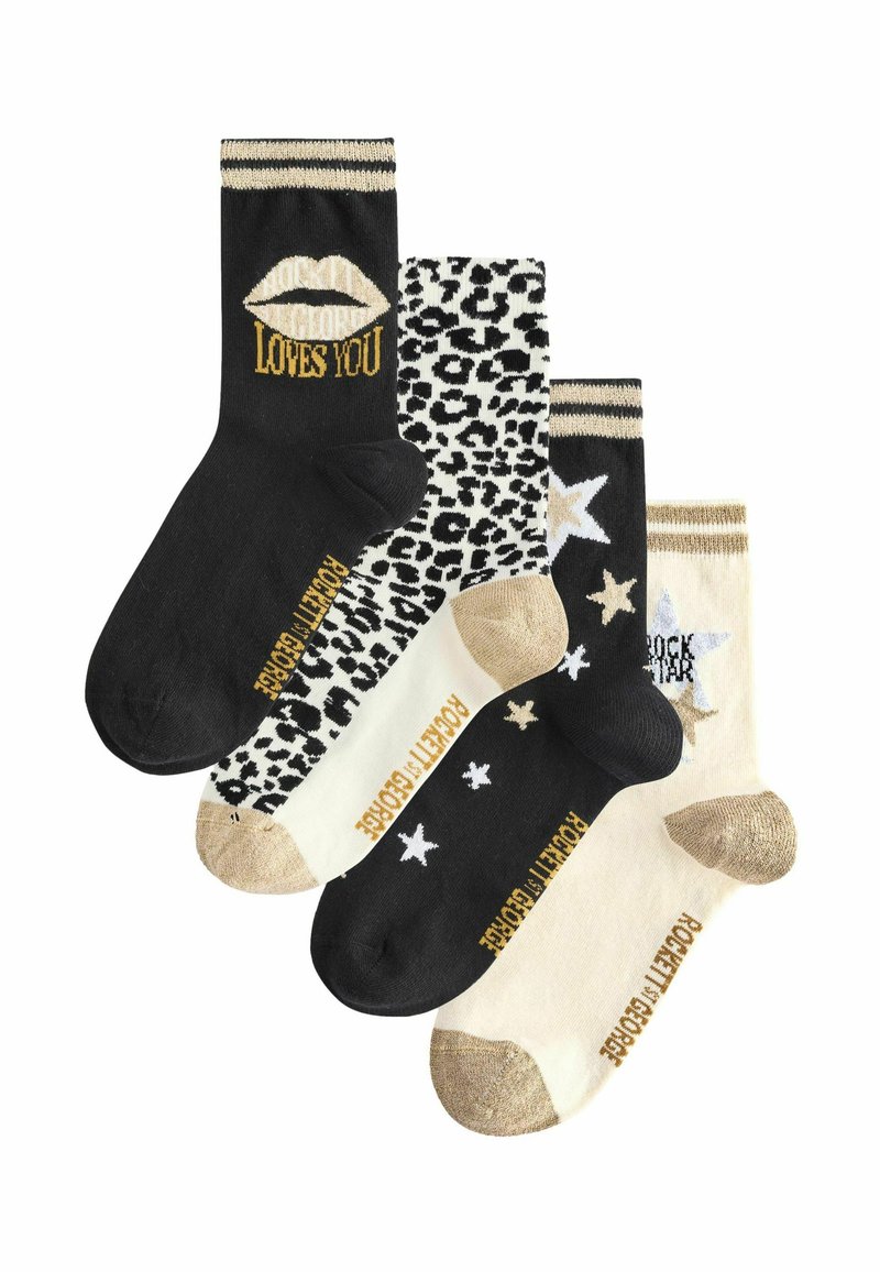 Vier Paare Socken: ein schwarzes Paar mit goldenen Lippen, ein Leopardenmuster, ein cremefarbenes Paar mit goldenen Sternen und ein cremefarbenes Paar mit einem silbernen Stern, alle mit gerippten Bündchen.