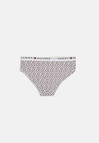 Witte katoenen bikini slips met een kleurrijke sterafdruk in roze en blauw, met een merk-elastische tailleband met de tekst "TOMMY HILFIGER".