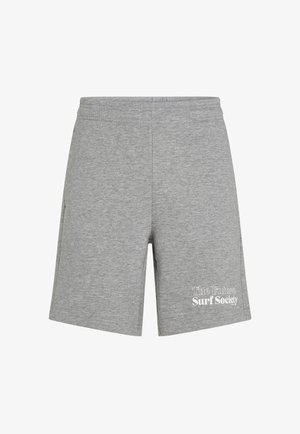 Hallid puuvillased lühikesed püksid elastse vöökohtaga, millel on tasku ja valge tekst "Tuleviku Surfiselts" vasakul jalal.