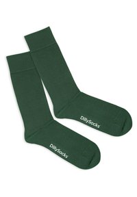 Grüne gerippte Socken aus weichem Material mit verstärkten Zehen und Fersen, auf denen der Markenname "DillySocks" in Weiß gedruckt ist.