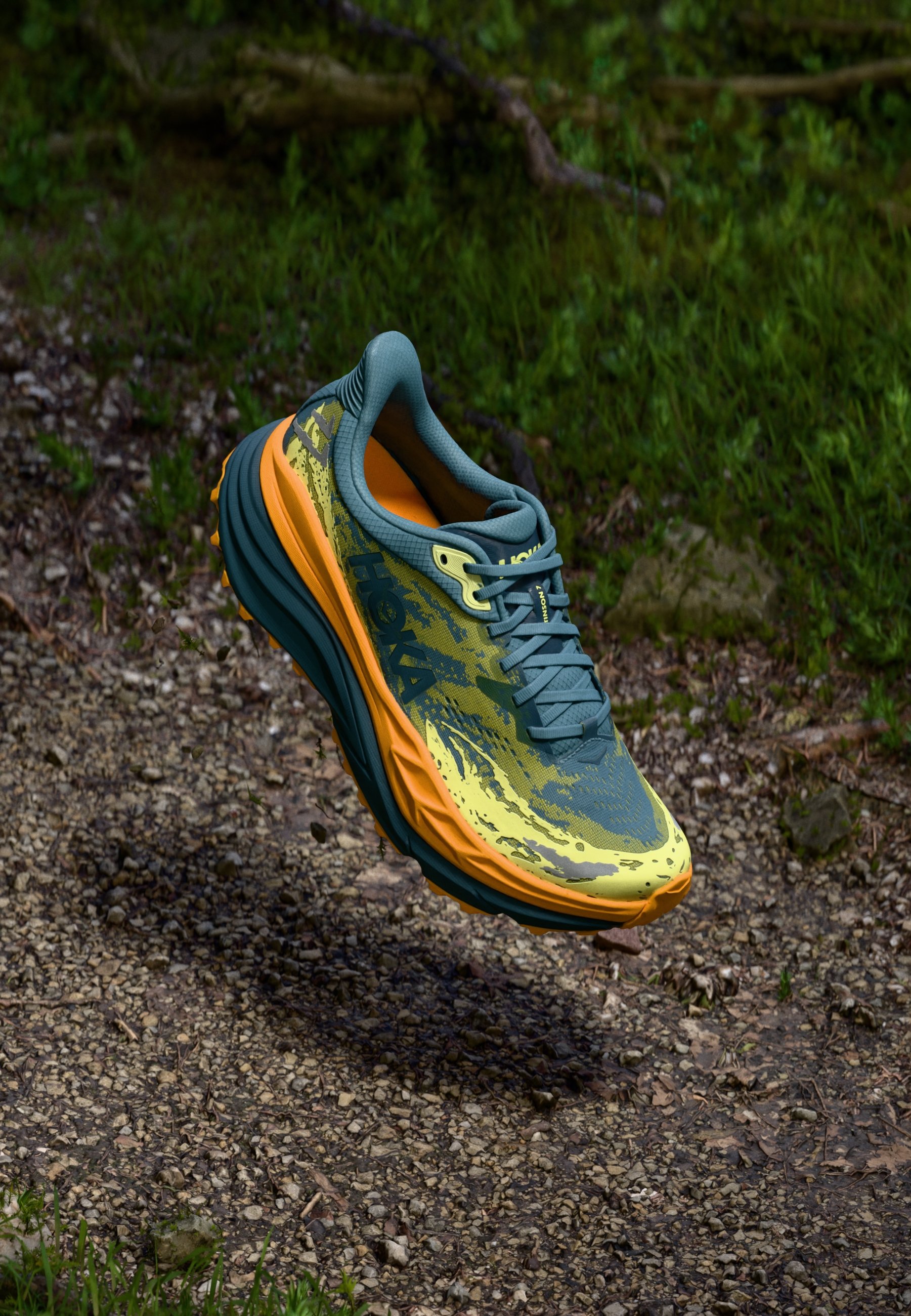 Hoka Yellow Running Shoes with Blue Logo and Orange Accents display picture 1