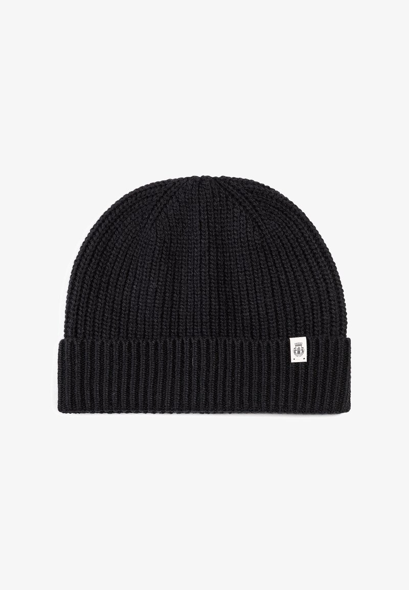Black knitted beanie with a ribbed texture, folded brim, and a small white label featuring a logo on the side. Classic design, warm material.