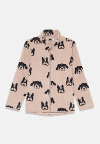 Giacca in fleece beige con zip, decorata con stampe di facce di cani in bianco e nero, dotata di colletto alto e maniche lunghe.