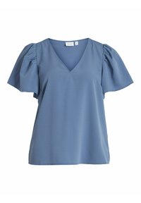 Blouse à manches courtes en V de couleur bleu clair avec des manches bouffantes. Tissu lisse, coupe légèrement ample. Étiquette visible à l'intérieur de l'encolure.