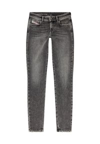 Slim-fit svarta jeans i denim med en bleknad textur. Har en standard midja, framfickor och lätt fransande vid fållen.