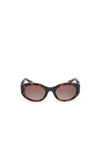 Ochelari de soare din material tortoiseshell cu lentile ovale supradimensionate, tenta de gradient maro închis, brațe negre elegante și accente hardware argintii.