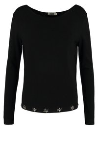 Haut en maille noir à manches longues avec un large col rond et de petites ornements floraux en argent le long de l'ourlet.