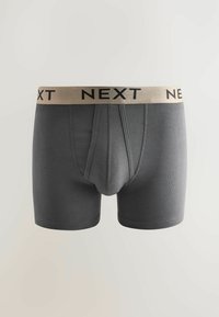 Hallgrå venitusriidest bokserid, millel on must ja kuldne elastne vöökoht "NEXT" logoga, sile viimistlus ja istuv disain.