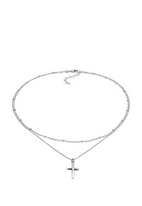 Sølvbelagt halskæde med to kæder, en med et kors vedhæng, struktureret overflade og små kugleformede detaljer på den øverste kæde.