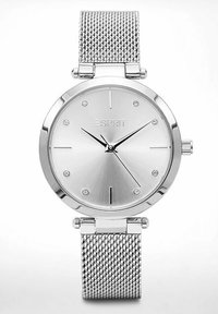 Orologio con cinturino in rete argentata, cassa rotonda, quadrante metallico e design minimalista. Presenta otto indici di cristallo per le ore e lancette eleganti.