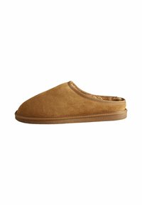 Tan suede slipper with a rounded toe, soft interior lining, and subtle stitching along the collar and sole, featuring a low-profile design.