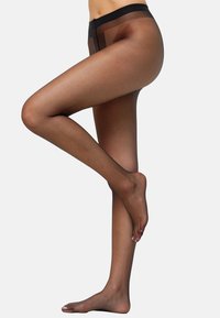 Gennemsigtige sorte strømpebukser med en glat, mat overflade og en bred, behagelig talje, der fremhæver benets naturlige form.
