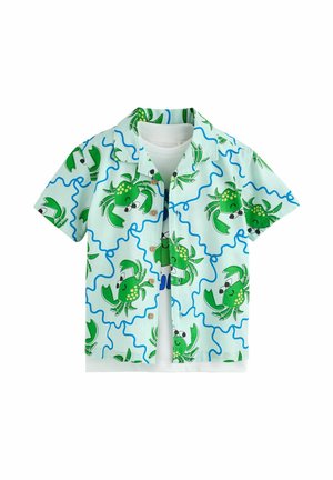 Short-sleeve light blue shirt with green cartoon crabs and blue wavy lines, layered over a plain white T-shirt.