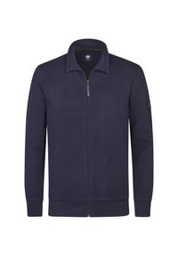 Granatowa kurtka typu zip-up z teksturowanym wzorem, stójką i dwoma bocznymi kieszeniami. Posiada naszywkę z logo na lewym rękawie.