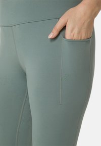 ASICS NAGINO FLEX - Leggings - monument blue