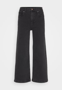 Jean noir à jambes larges en denim de coton, avec une taille haute, un design à cinq poches et une fermeture à bouton en métal à l'avant.
