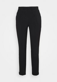 Svarta joggerbyxor med elastisk midja, snörstängning och tighta anklar. Har sidofickor och subtil logotypdetalj.