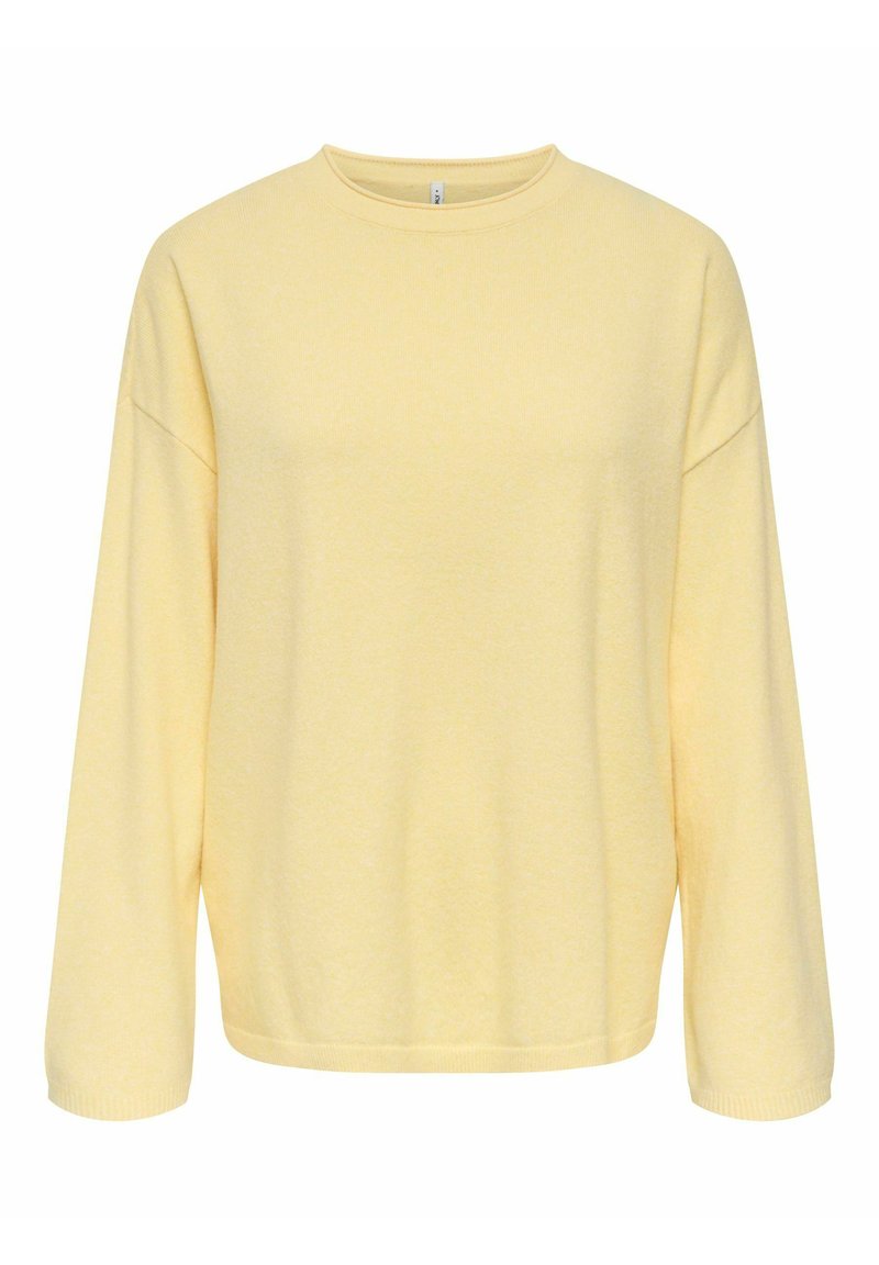 Pull-over jaune en tissu doux, avec un col rond, des épaules tombantes et des manches longues avec des poignets côtelés.