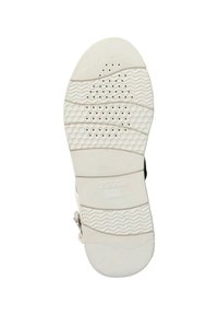 Suela de zapato de goma blanca con patrones de huellas texturizadas, orificios de aire para transpirabilidad y logo en relieve. Acabado suave y bordes redondeados.
