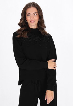 - Sweter