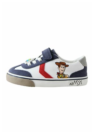 Child’s sneaker with blue and white colors, red chevron detail, Velcro strap, character Woody from Toy Story on side, and "Andy" handwritten on sole.