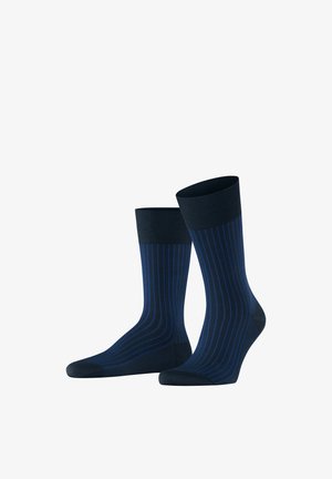 Dunkelblaue Socken mit hellblauen vertikalen Streifen. Gerippte Bündchen, glatte Textur und verstärkte Zehen und Fersen für Langlebigkeit.