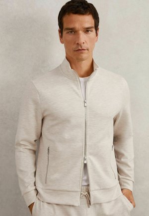 Užtrauktuku užsegamas treningas - oatmeal