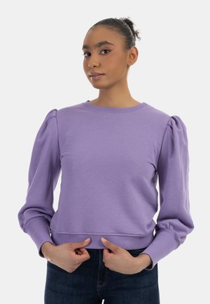 Felpa viola con maniche a sbuffo, scollatura rotonda, polsini e orlo a costine. Realizzata in tessuto morbido, presenta una vestibilità rilassata e un colore uniforme.