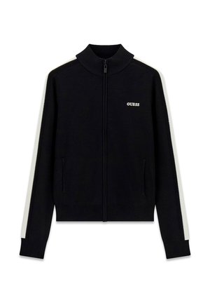 Zwarte trui met ritssluiting, witte strepen langs de mouwen en "GUESS" logo op de linkerborst, geribde kraag, manchetten en zoom.