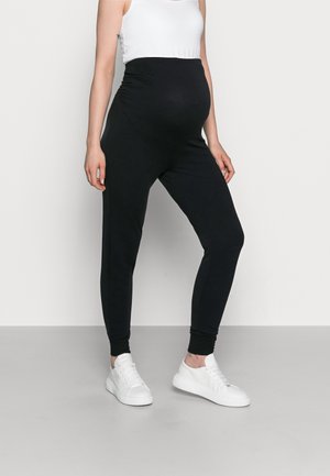 Pantalones deportivos - black