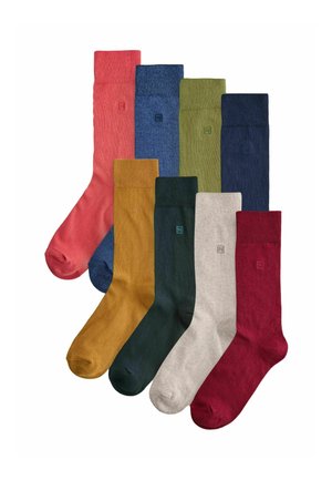 Satz von acht Socken in verschiedenen Farben: Koralle, Blau, Grün, Marine, Senf, Dunkelgrün, Grau und Burgund. Baumwollstoff mit gerippten Bündchen.