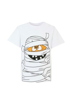 Biała koszulka z bawełny z wzorem cartoonowego mumii, posiadająca pomarańczowe oko, czarne zęby i czarne kontury owijania. Krótkie rękawy, okrągły dekolt.