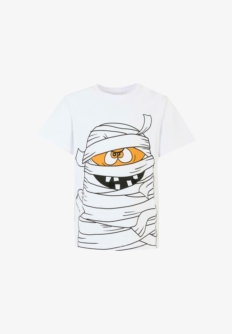 T-shirt en coton blanc avec un design de momie en cartoon, un œil orange, des dents noires et des contours noirs de bandelettes. Manches courtes, col rond.