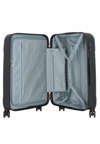 Valigia nera con guscio rigido, tasche interne con zip, rivestimento in tessuto grigio, cinghie regolabili e ruote angolari per la mobilità.