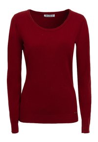 Maglione rosso a maniche lunghe con collo rotondo, realizzato in tessuto morbido. Presenta polsini e fascia in costina, con un piccolo logo accentato sul lato inferiore.