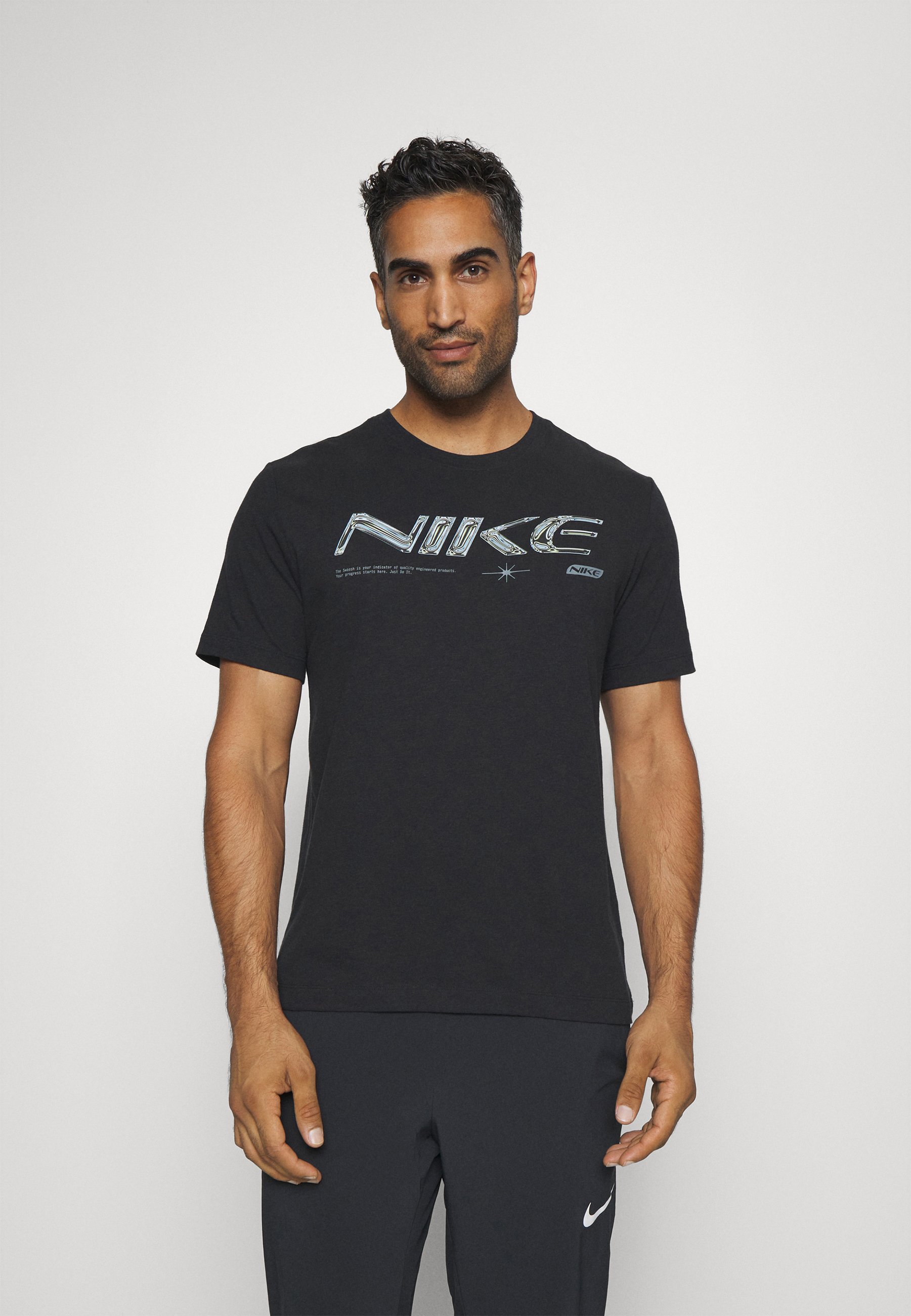 gray and black nike shirt