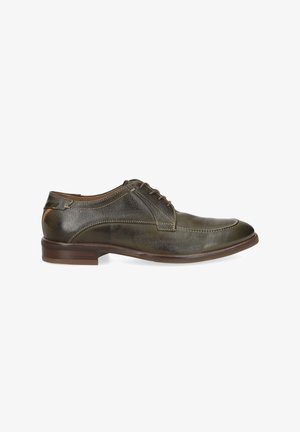 Chaussure habillée pour homme en cuir marron foncé avec fermeture à lacets et petit talon en bois, vue de profil sur un fond blanc.