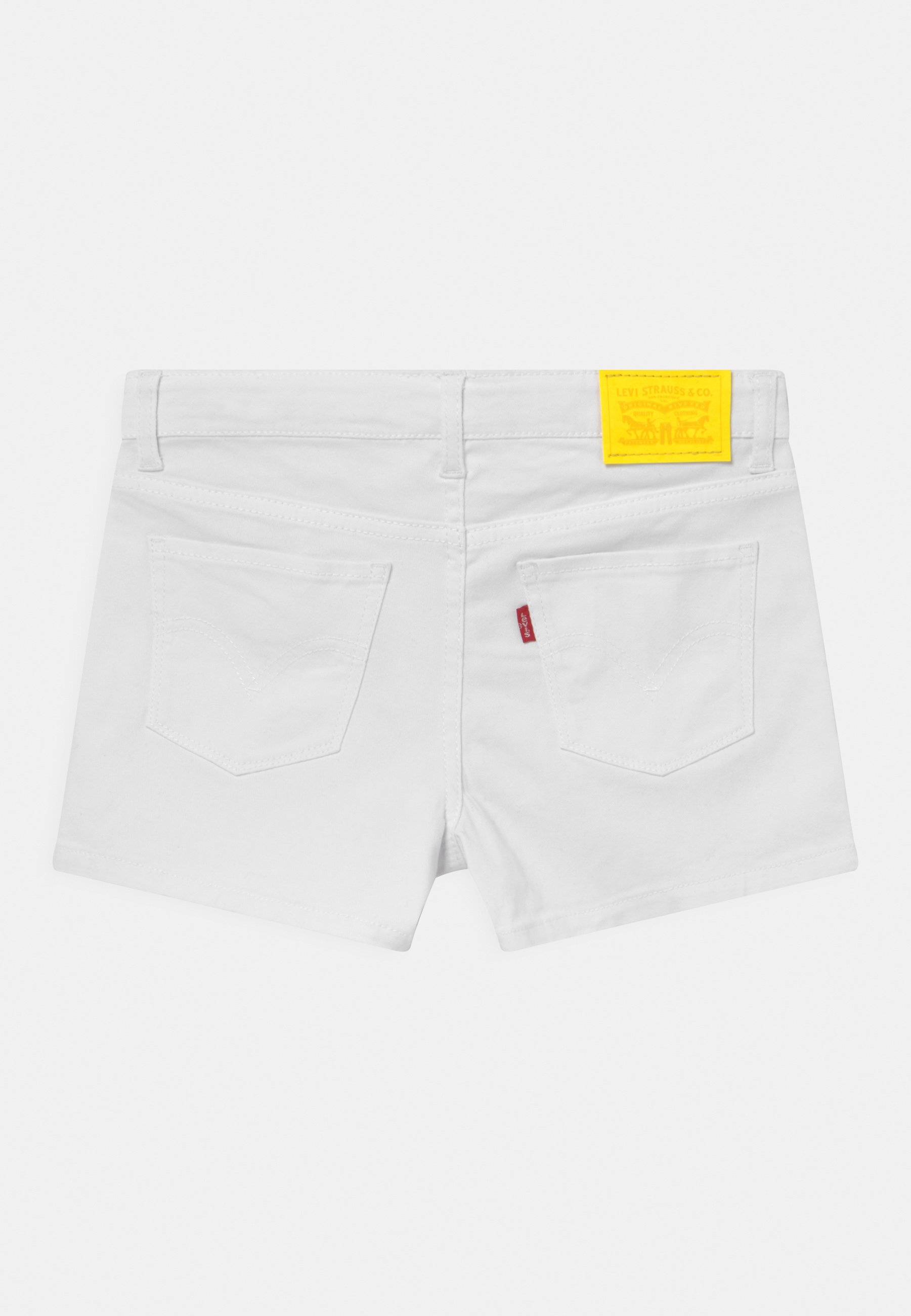 white levi shorts