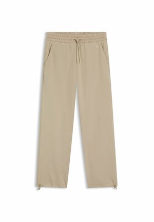 Jogger beige leggeri con vita elastica, chiusura con coulisse, due tasche laterali e dettagli con zip all'orlo.