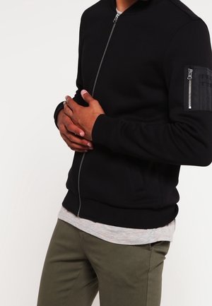Sweater met rits - black