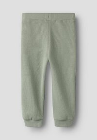 Jasnozielone prążkowane spodnie dresowe z elastycznym paskiem i ściągaczami, o gładkiej fakturze i prostym designie.