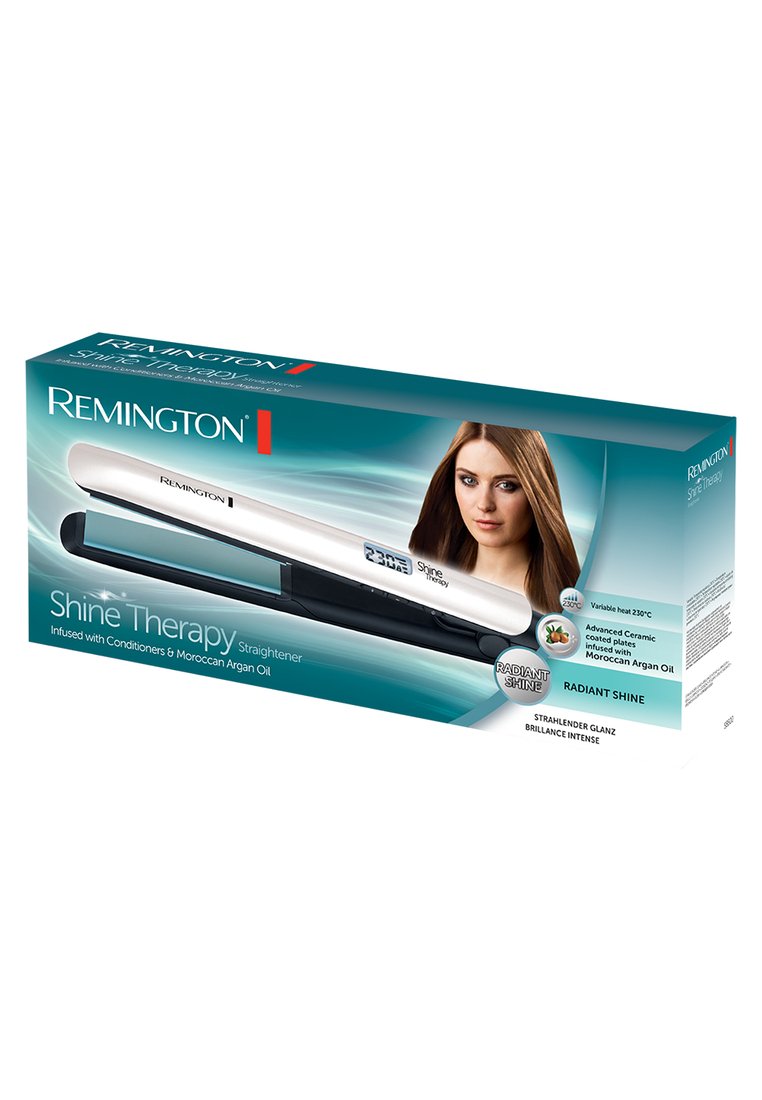 Der Remington Shine Therapy Glätteisen in Weiß und Schwarz verfügt über fortschrittliche keramikbeschichtete Platten, die mit marokkanischem Arganöl angereichert sind.