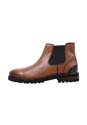 Botte Chelsea en cuir marron avec panneau latéral élastique noir et talon noir, dotée d'une semelle robuste et d'un détail de talon empilé.