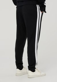 Terranova IN INTERLOCK CON BANDE - Pantaloni sportivi - nero